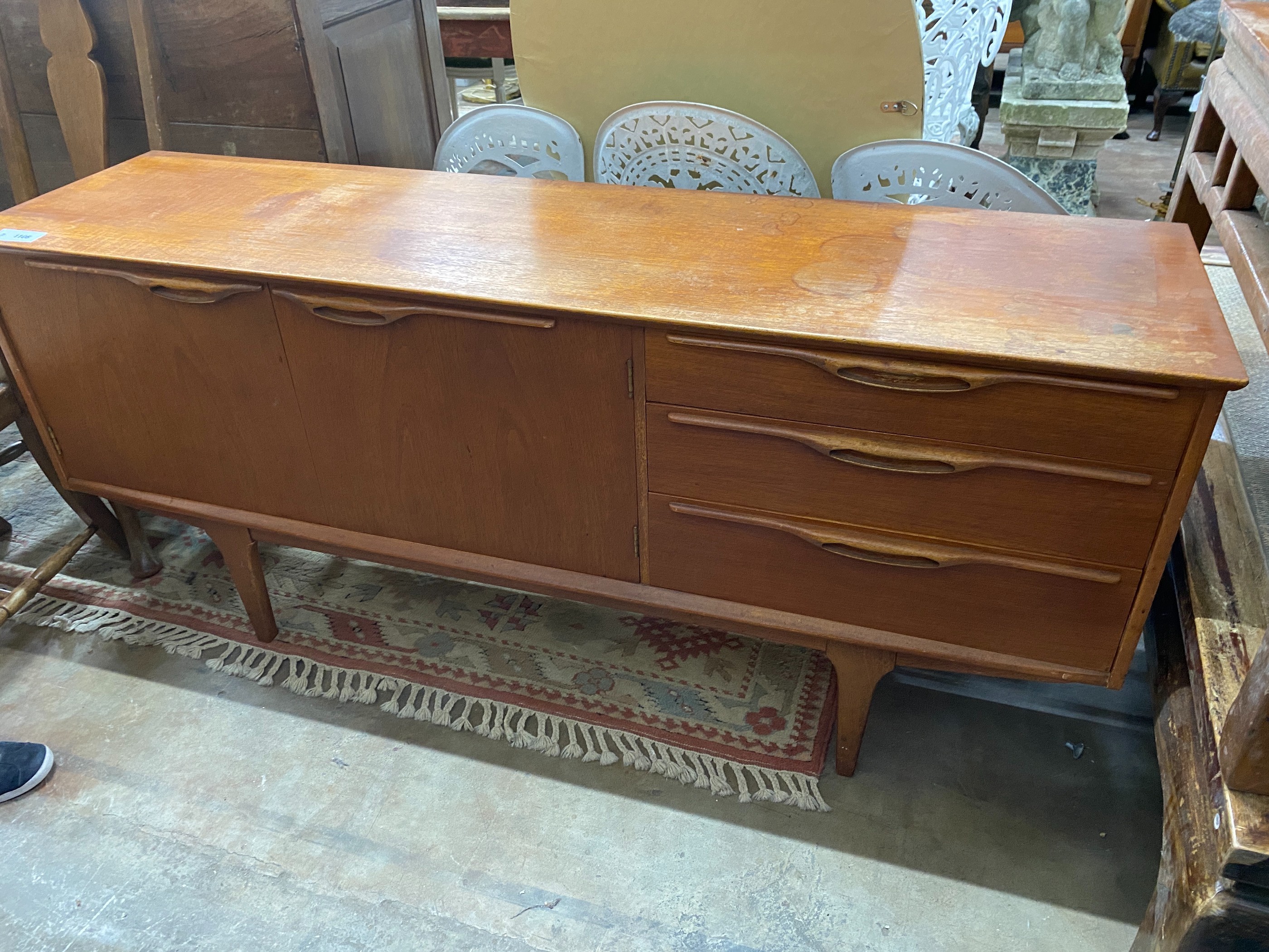 A mid century teak sideboard, length 168cm, depth 45cm, height 74cm